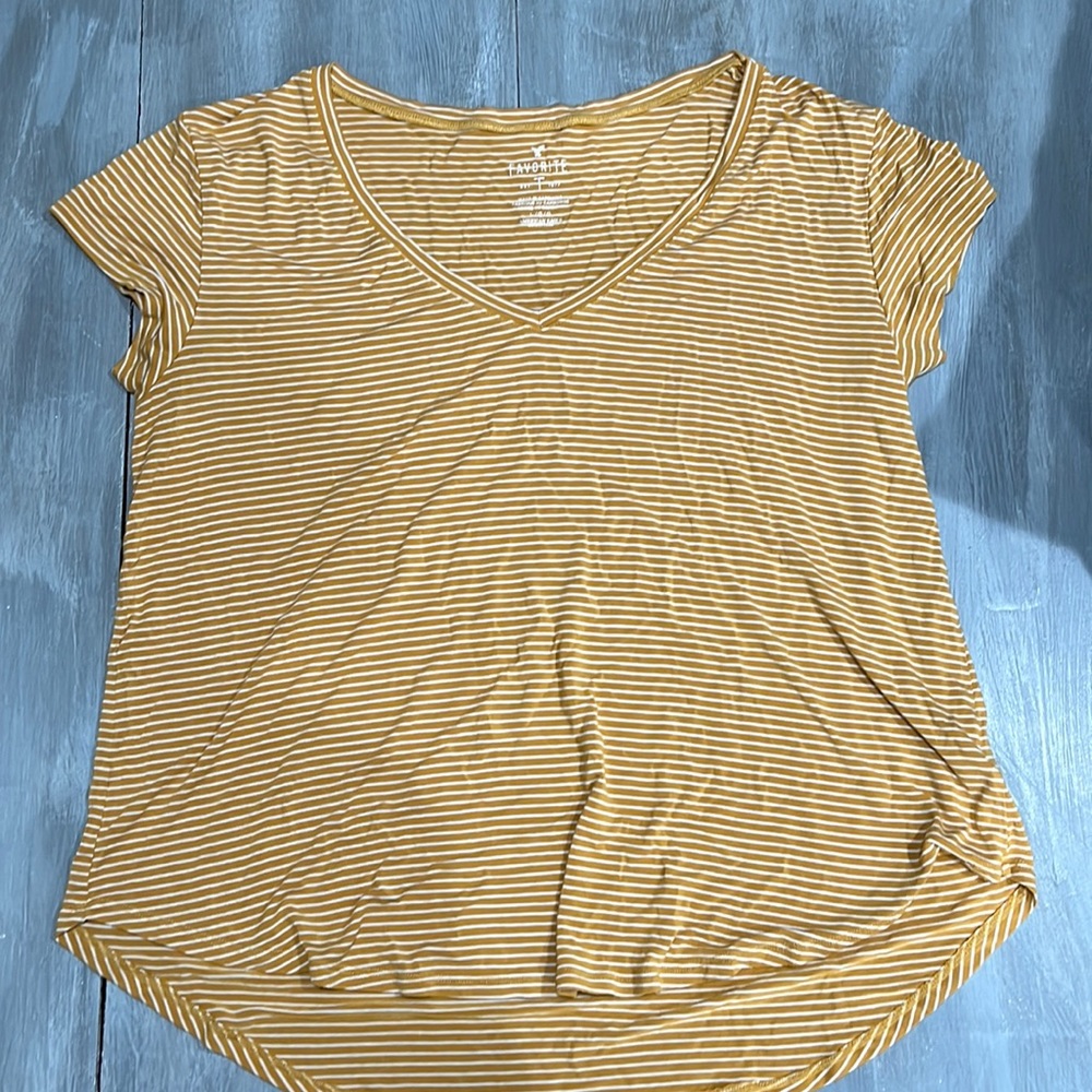 yellow and white striped american eagle shirt
